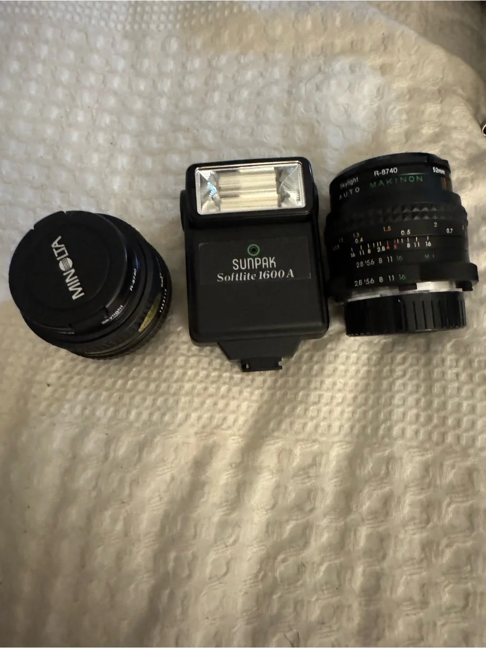 X-7 Minolta Black SLR Camera with Telephoto Lens